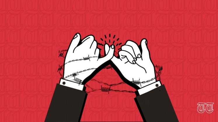 An illustration is shown of barbed wire surrounding hands. — FILE/THE THURSDAY TIMES