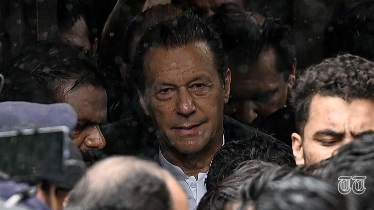 A file photo is shown of PTI president Imran Khan leaving the Islamabad anti-terrorist courts on August 25th.