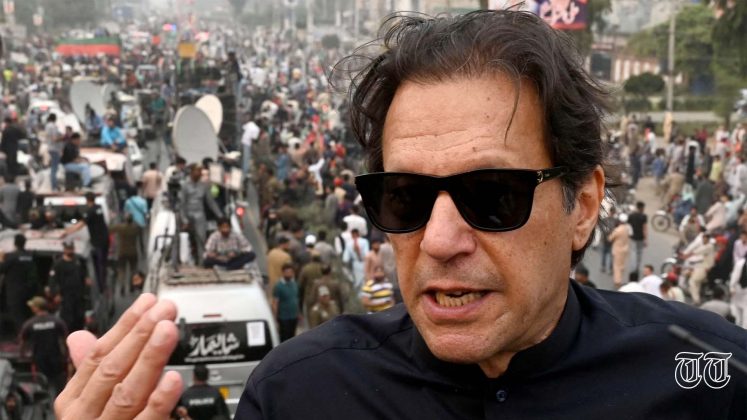 PTI president Imran Khan is pictured speaking at an anti-government march at Gujranwala.