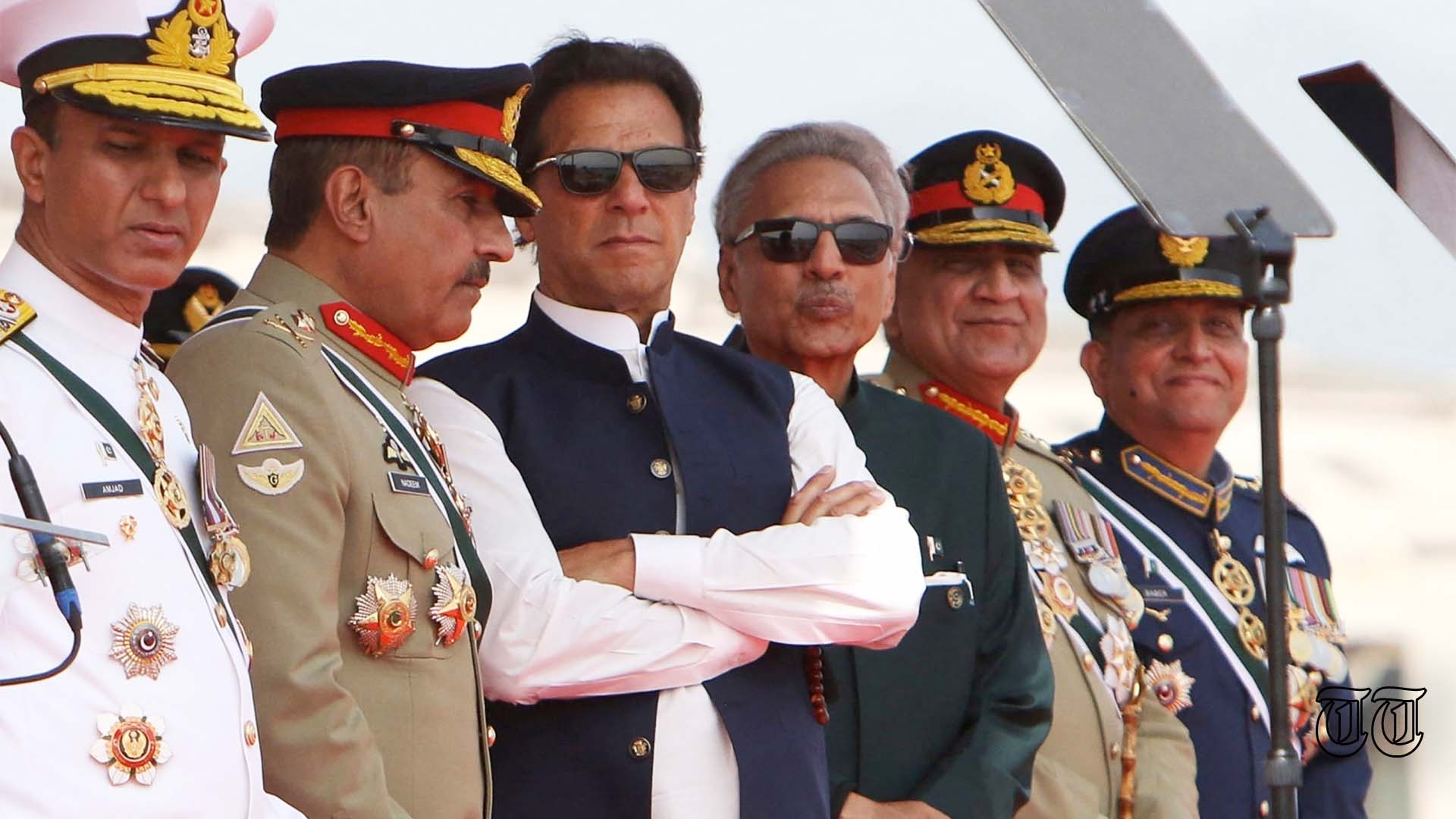 A file photo is shown of PTI president Imran Khan with President Arif Alvi and former COAS Qamar Bajwa on the 23rd of March, 2022.