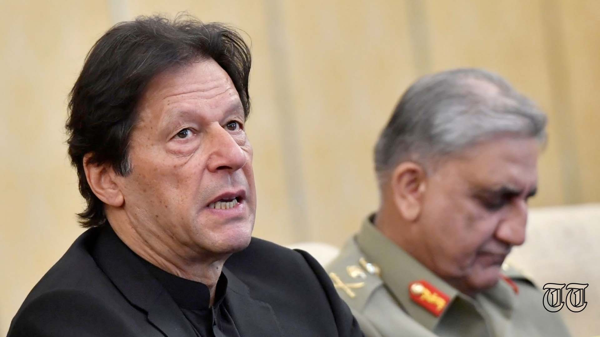 A file photo is shown of PTI president Imran Khan alongside former COAS General Bajwa at Beijing in 2019.