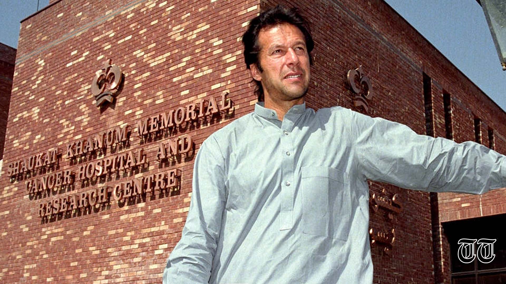 A file photo is shown of PTI president Imran Khan standing outside Shaukat Khanum Memorial Cancer Hospital, Lahore in 1997.