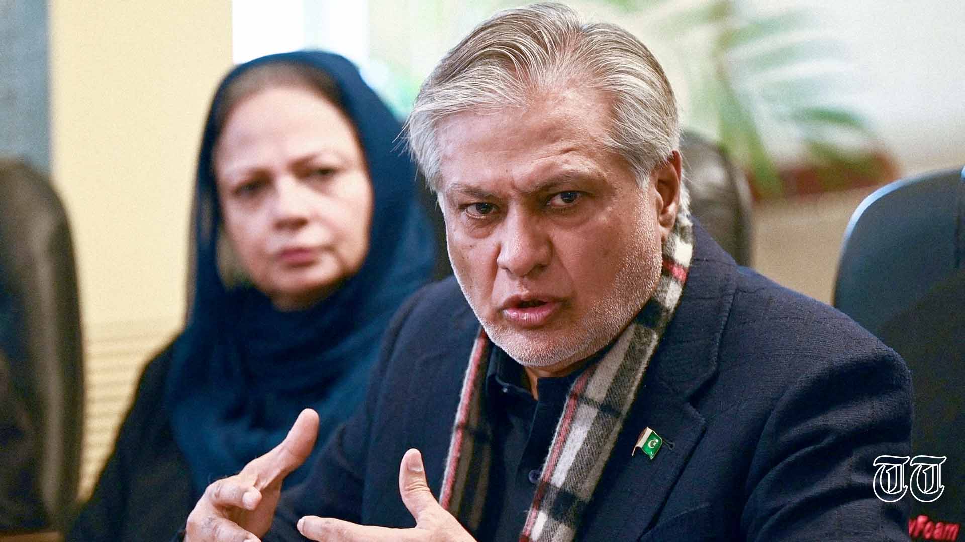 A file photo is shown of finance minister Ishaq Dar addressing a press conference in February 2023.