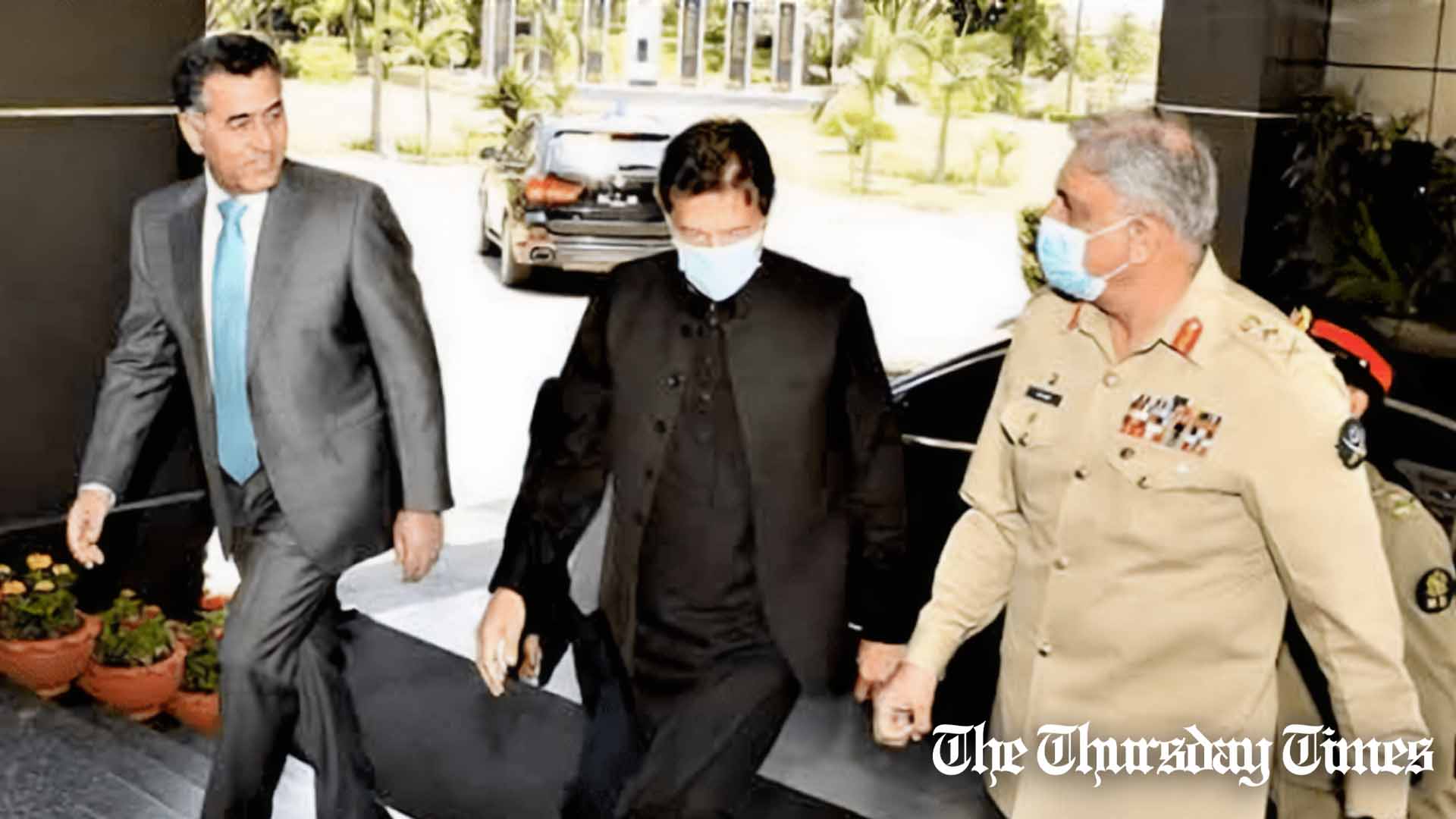 A file photo shows, from left to right, former ISI chief Faiz Hameed, PTI chairman Imran Khan, and former COAS Qamar Javed Bajwa. — FILE/THE THURSDAY TIMES