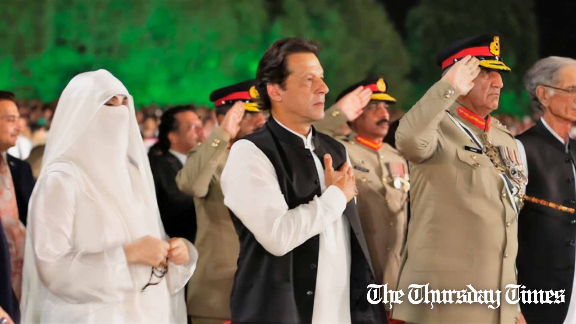 A file photo is shown of former first lady Bushra Maneka (L), PTI chairman Imran Khan (C), and former COAS General Qamar Javed Bajwa on March 23, 2022. — FILE/THE THURSDAY TIMES