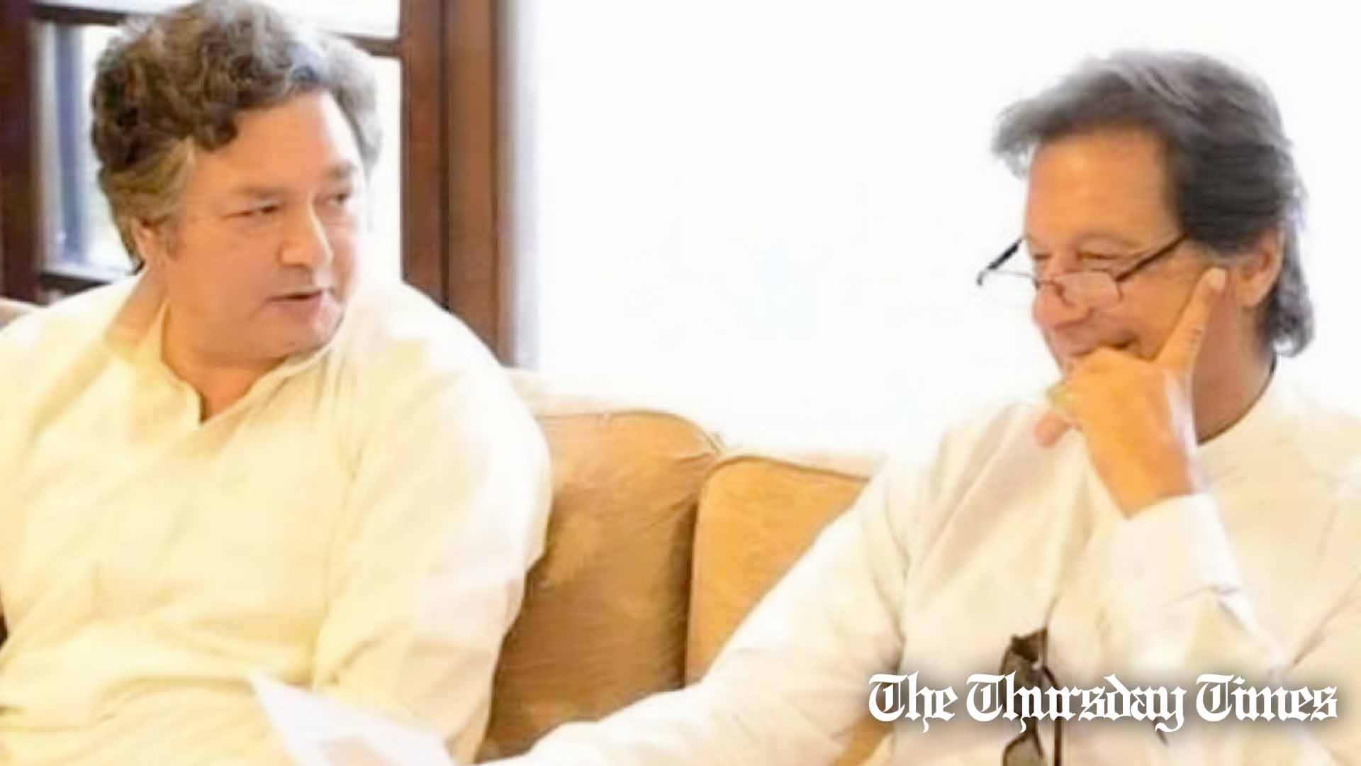 A file photo is shown of former PTI principal secretary Azam Khan (L) and PTI chairman Imran Khan (R). — FILE/THE THURSDAY TIMES