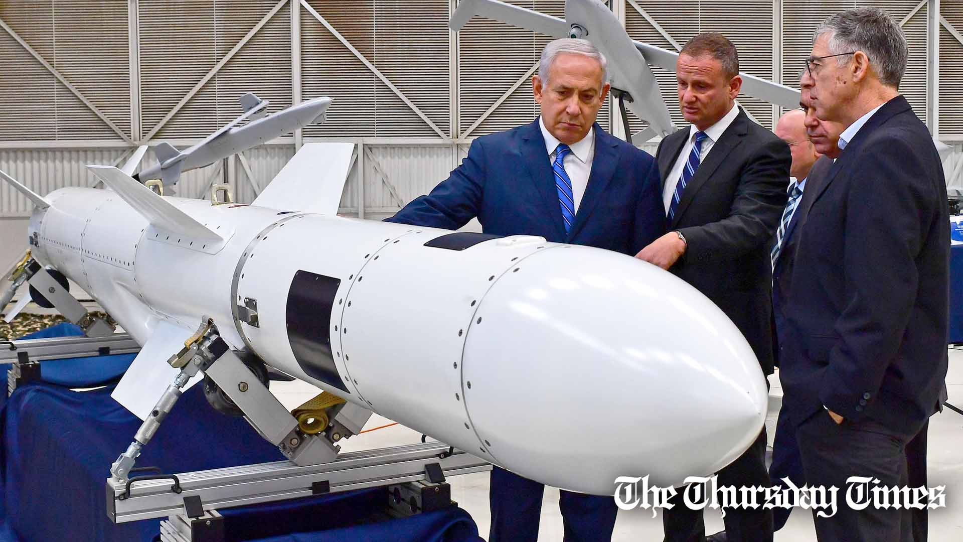 A file photo is shown of Israeli prime minister Benjamin Netanyahu examining a rocket with colleagues. — FILE/THE THURSDAY TIMES