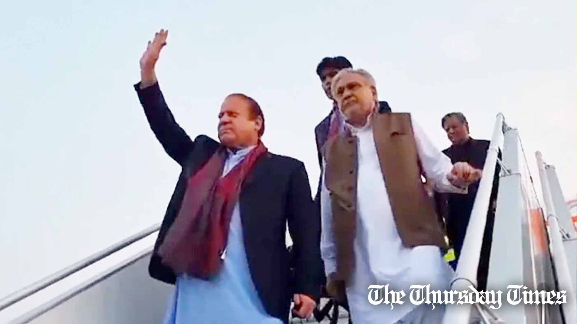 A file photo is shown of former prime minister Nawaz Sharif and former finance minister Ishaq Dar disembarking a plane on October 21, 2023. — FILE/THE THURSDAY TIMES