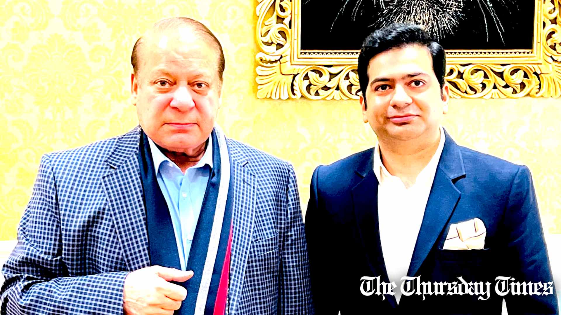 A file photo is shown of PML(N) supremo and former prime minister Nawaz Sharif (L) with PMLN incumbent secretary information Zeeshan Malik (R). — FILE/THE THURSDAY TIMES